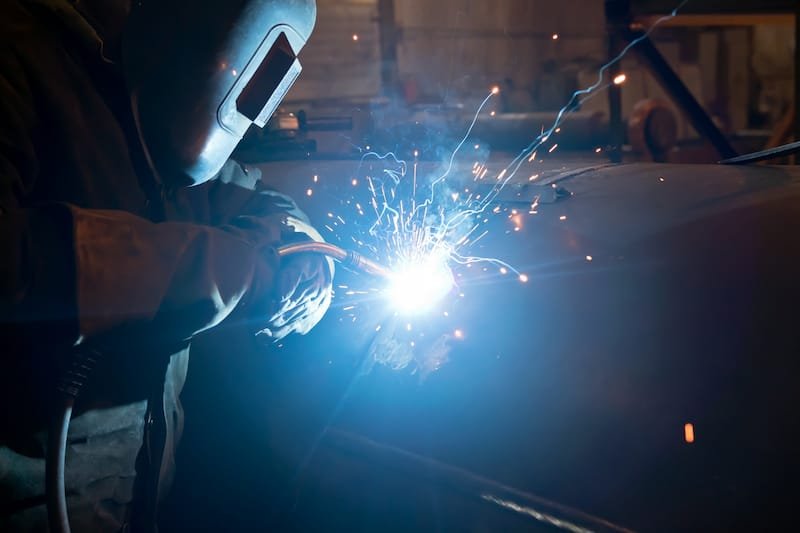 welder welding dissimilar metals